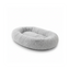 Soft gray oval plush pet bed for dogs and cats on white background