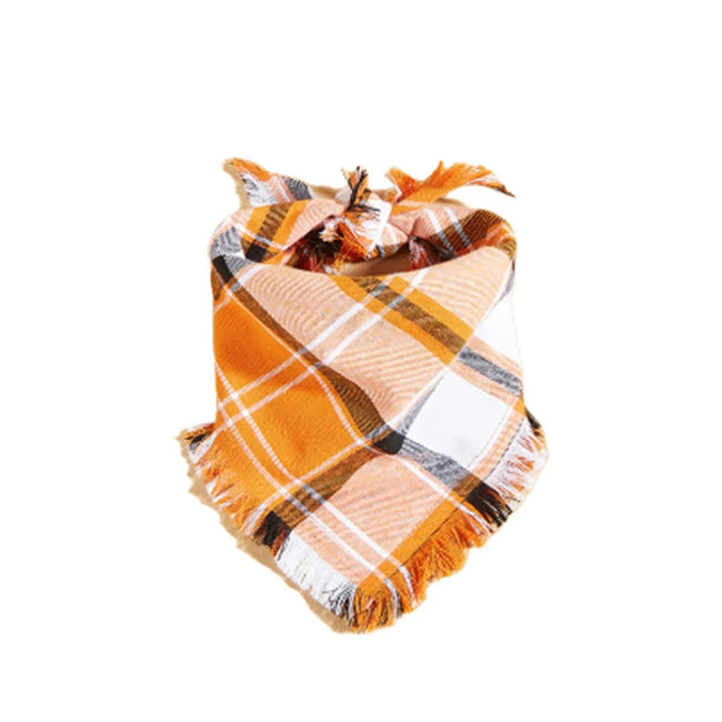 Orange plaid pet bandana with fringe, stylish dog accessory on white background Hover Image