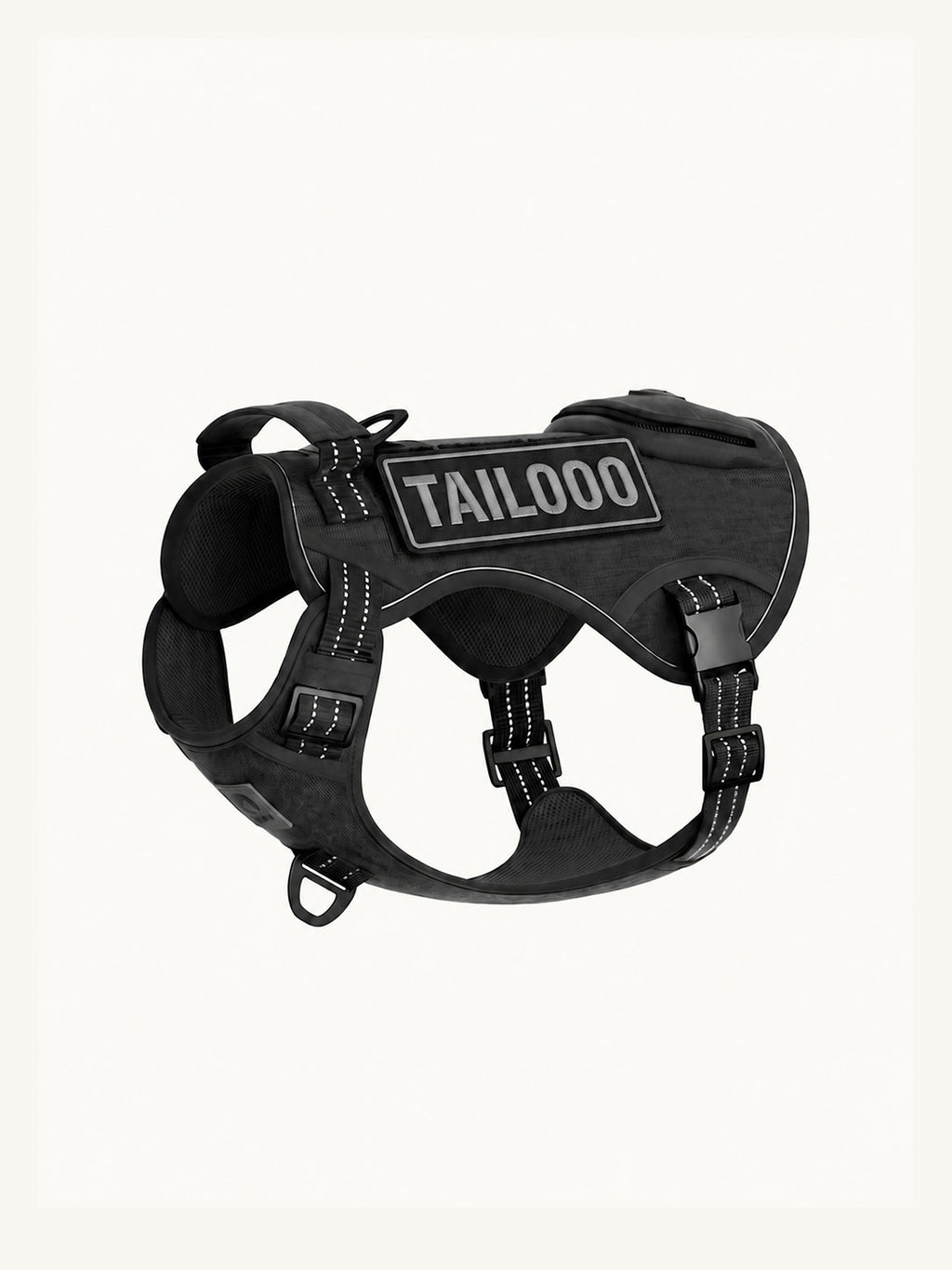 Isolated black tactical dog harness with reflective stitching, a no-pull easy walk dog harness with multiple D-rings for leash attachments.