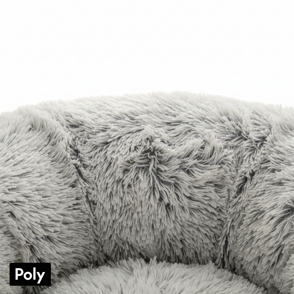 Close-up of soft, fluffy grey pet bed made of polyester fabric, cozy and plush texture.