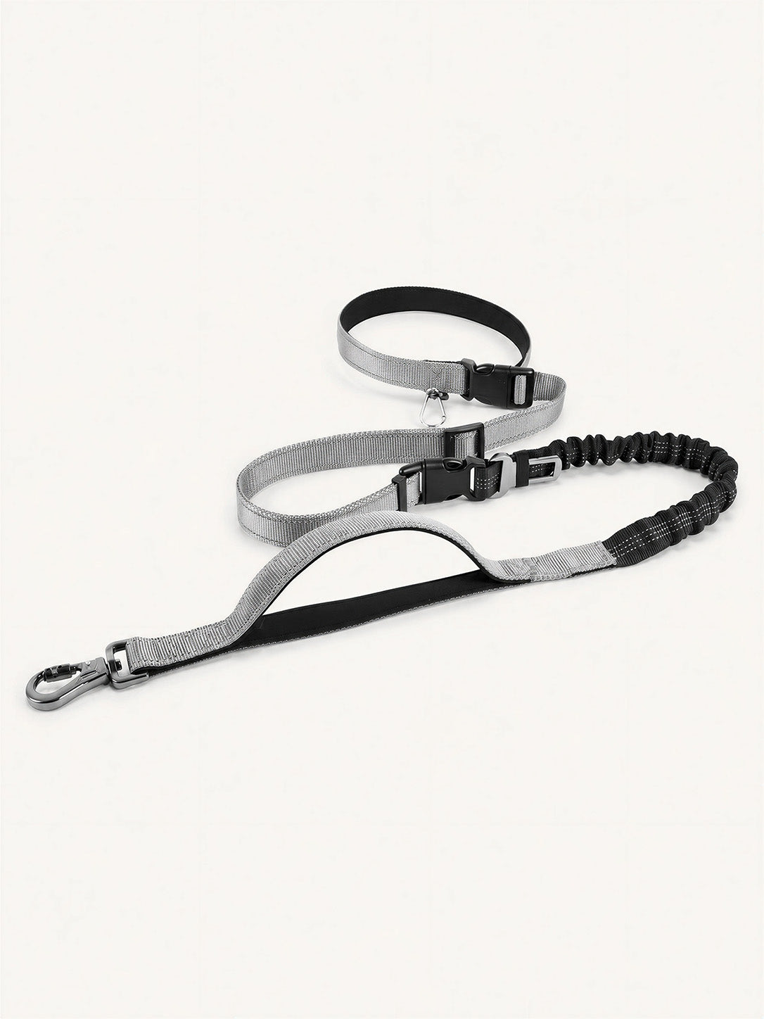 Multifunctional hands-free long dog leash with bungee shock absorption, adjustable waist belt, and reflective stitching for safe, comfortable walking and running.