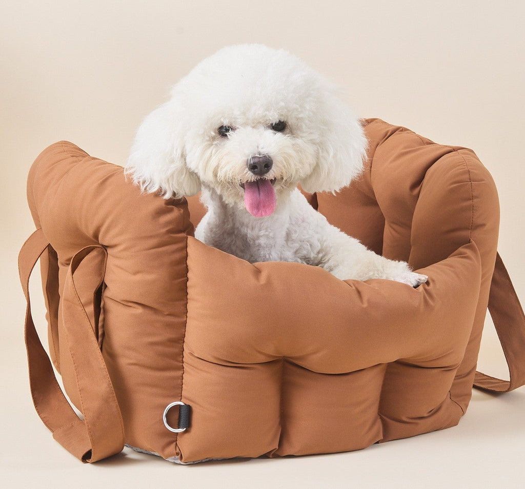  Stylish orange dog car seat that adds a pop of color to your car while keeping your furry friend cozy and safe.