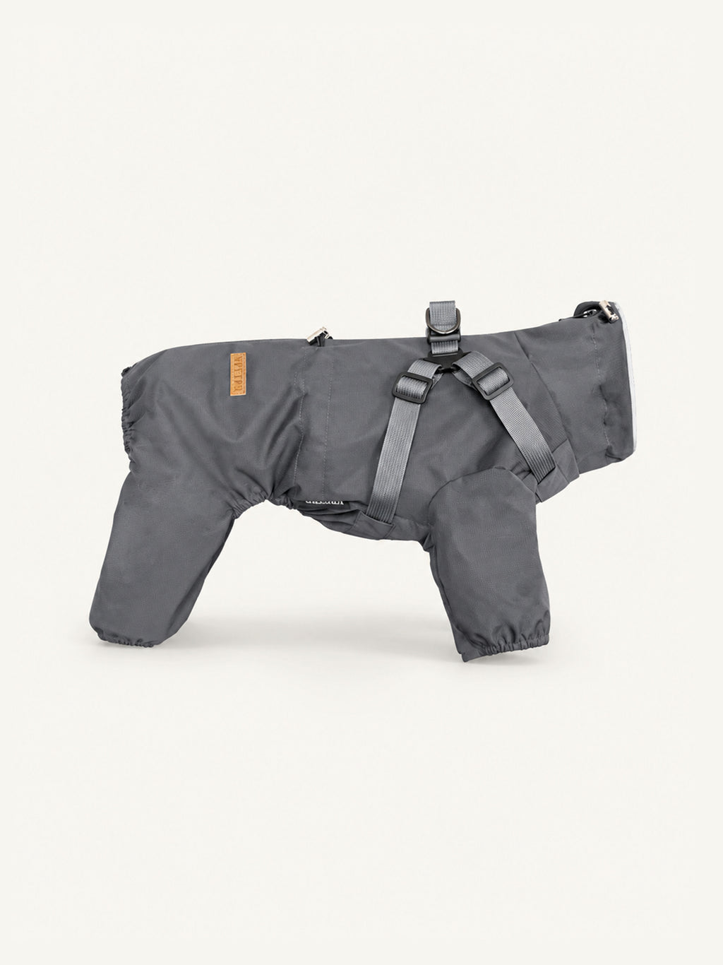 Full-body dog rain coat with built-in harness, waterproof and windproof dog apparel for all-weather outdoor use.