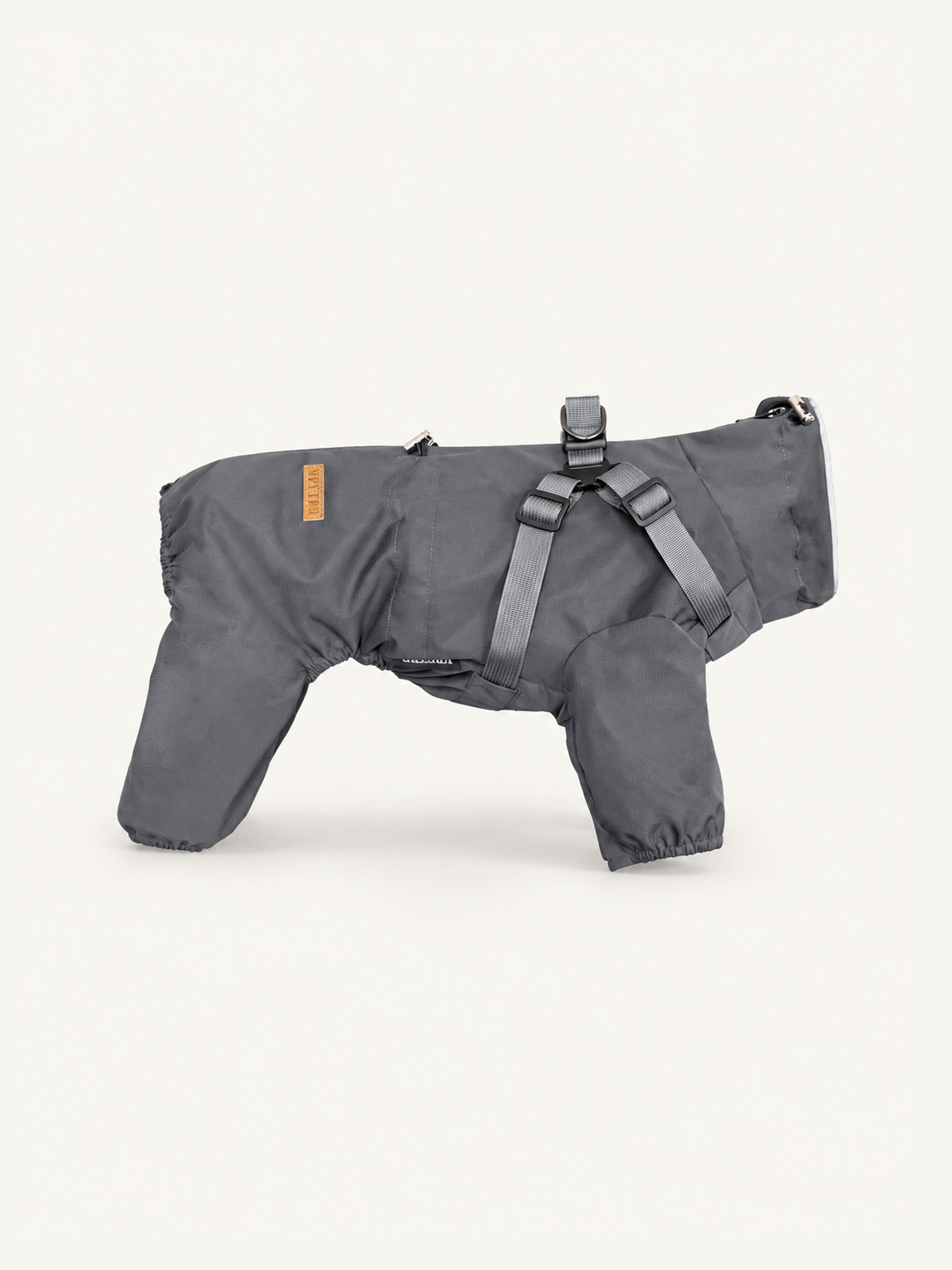 Full-body dog rain coat with built-in harness, waterproof and windproof dog apparel for all-weather outdoor use.