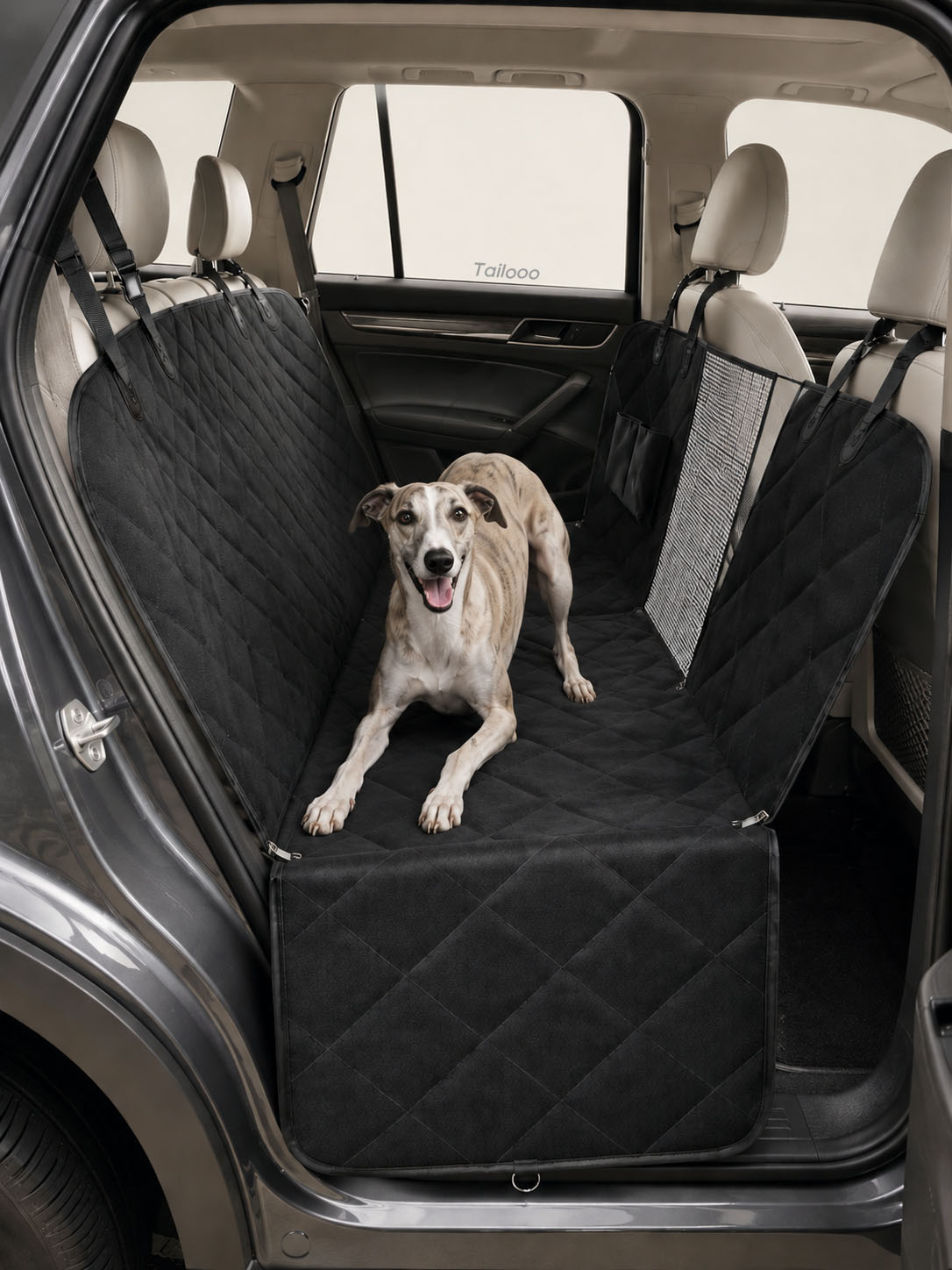 Whippet resting comfortably on a quilted waterproof dog car seat, a durable dog safety seat for car travel to protect your backseat.