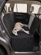 Whippet sleeping on a quilted dog car seat cover, highlighting the soft, supportive padding of this dog safety seat for car.